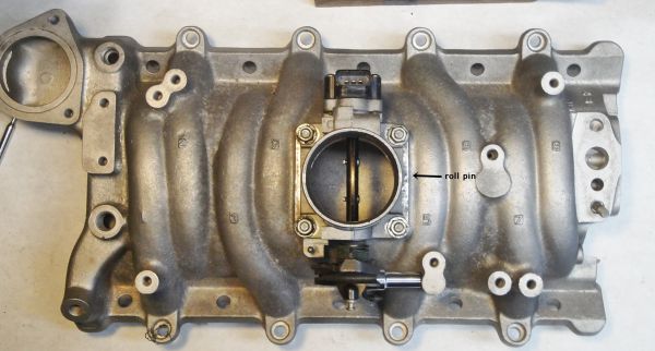 intake_manifold_and_Ford_70mm_throttle_body_fitted_showing_roll_pin.jpg