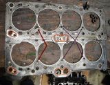 2016_head_gasket_compared_to_2013_gasket_-_failure_in_same_place.jpg